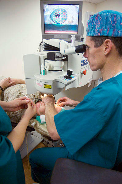 A doctor performing LASIK.