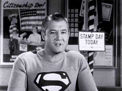 George Reeve, first TV Superman, in the U.S. Treasury Dept., to talk Stamp Day.