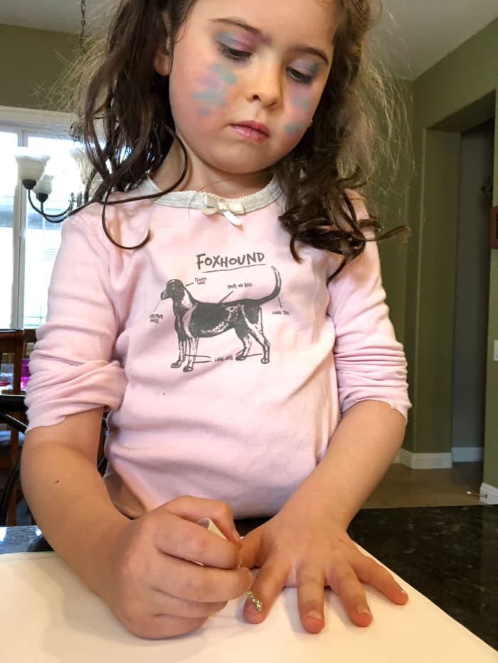 Can you tell she also did her own makeup that day? Not to worry, it was kid makeup and easily washable!