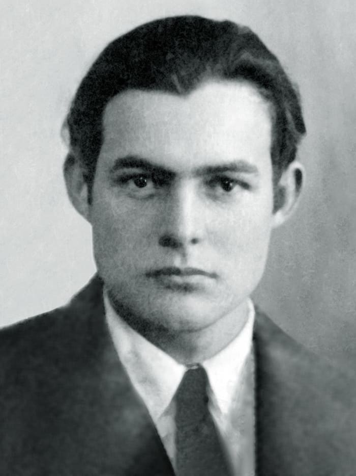 The passport photo of a young Ernest Hemingway, taken when he was married to Hadley and living in Paris.