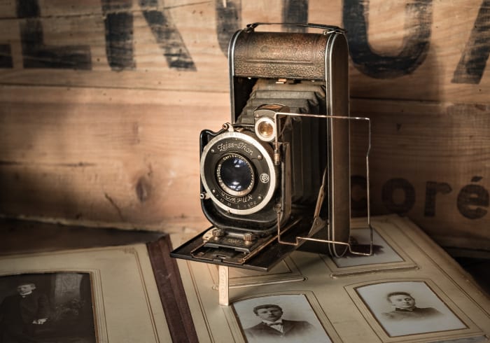 Photos in cardboard frames often give you clues with the name of the photography studio and town.