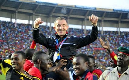 Milutin Sredojevic smiles and raises his arms as players carry the manager following an Uganda. Thanks to Sredojevic, Uganda secured its first trip to the Africa Cup of Nations in nearly four decades in September 2016.