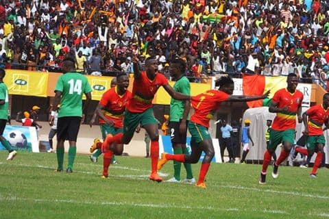 Guinea-Bissau player (red) celebrates during a 2017 Africa Cup of Nations qualifier against Zambia in Bissau on June 4, 2016. This victory, coupled with another result, secured a spot at the 2017 African Cup of Nations.
