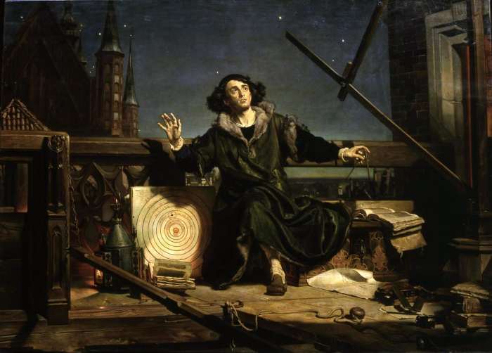 1873 painting titled “Astronomer Copernicus, or Conversations with God” by Jan Matejko. The painted depicts Copernicus atop his tower at Frombork—with the cathedral’s spires in the background—observing the sky with his wooden rulers (right).