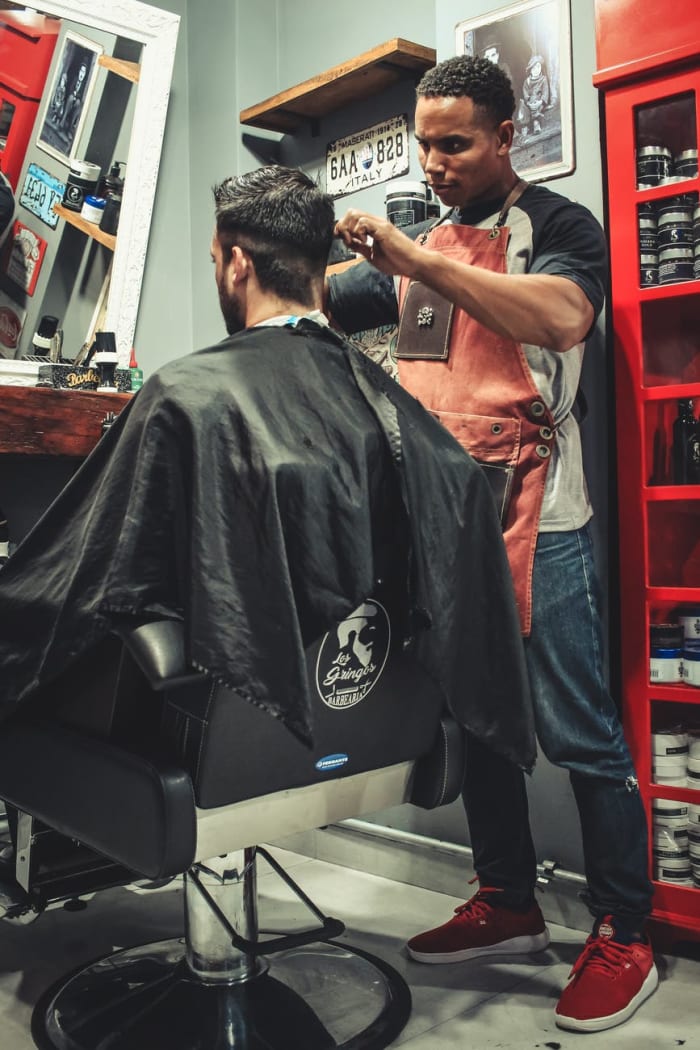 My dad was a barber (among his many talents), but I never had a photo of him.