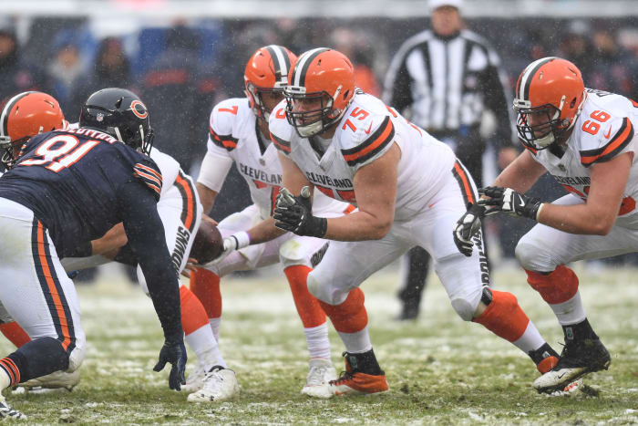 Cleveland Browns offensive linemen, Joel Bitonio (75) and Spencer Drango (66), defend the line of scrimmage during a 2017 game against the Chicago Bears. The Browns have produced numerous standout offensive linemen during their 71-year history.