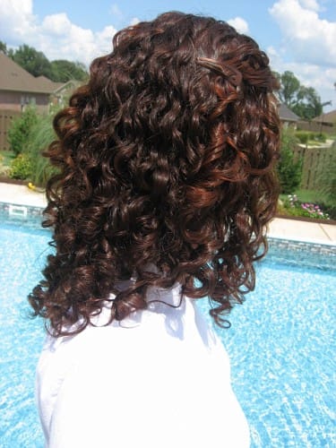 Henna combines with your natural hair color. When used on dark brown hair, it forms a dark auburn color.