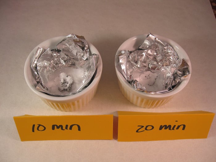 10 minutes versus 20 minutes:The two earrings, each in their respective bath, just before water was added.