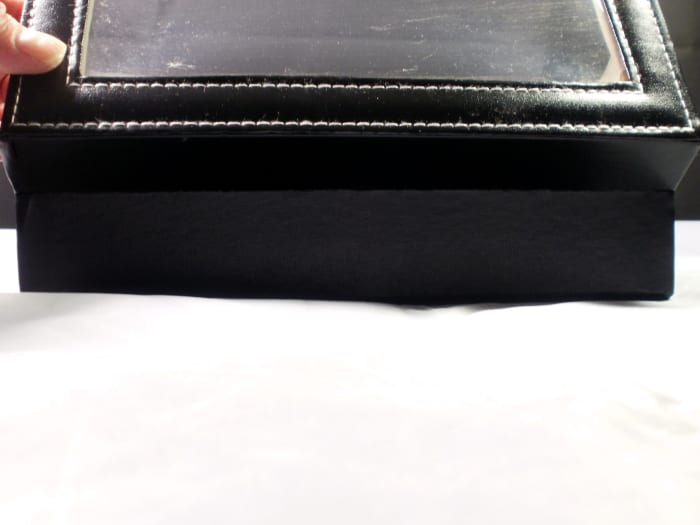 Note the fold along the back of the box when it is opened. Over time the material will begin to split.