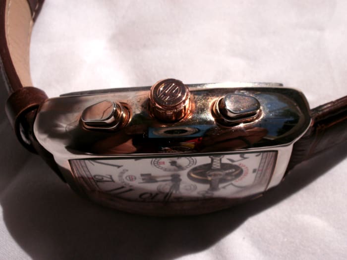 Thin gold colored coating has been partially removed due to overenthusiastic buffing with metal polish