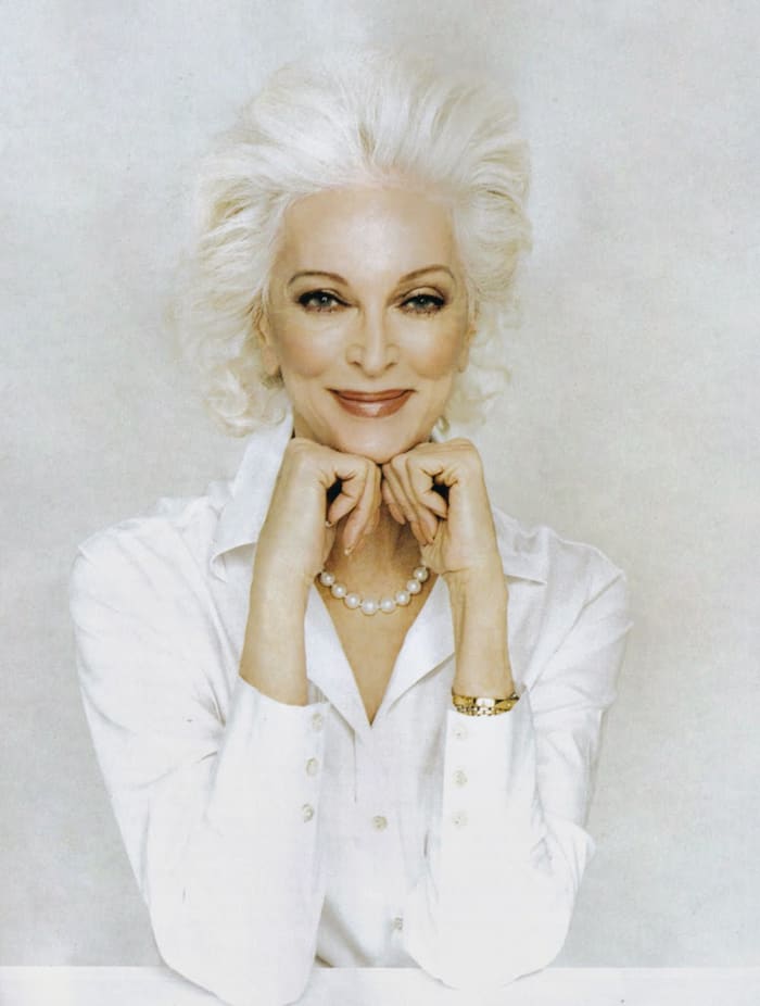 The whole package, from stylish cut, simply elegant clothing, and attractive well done makeup.