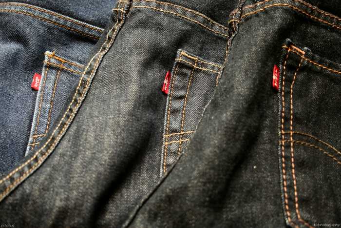 Levi's come in a wide array of size, style, and color options. You can get them in various different weights of denim: some 100% cotton and some with spandex. They're even available with holes already worn into the fabric.
