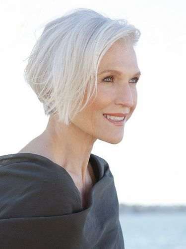 Short cut with long top layers. This is my favorite short hairstyle. The crown hair is kept long and angled toward the chin.