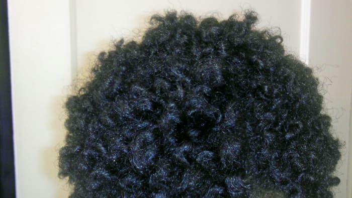 Having straight hair on the crown makes it difficult to get a uniform twist out look with many products on the market.