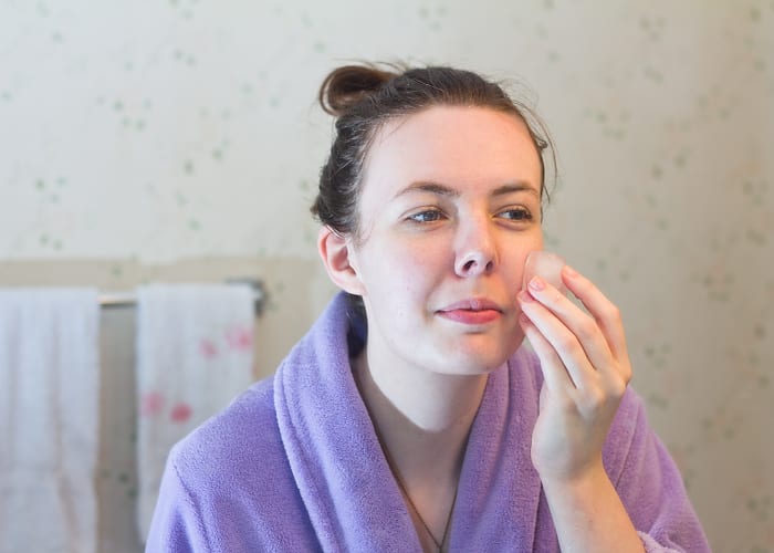 Rinse mask with tepid water and pat face dry. Use a toner, chilled water, or an ice cube to close your pores.