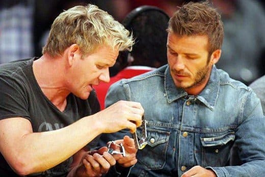 Chef Gordon Ramsay and Beckham, seen exchanging watches at a Laker's game. Beckham appears to have an eye for timepieces.