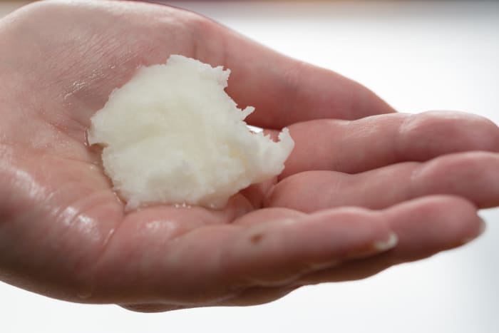 If you don't need liquid oil or if you're short on time, simply grab a bit of oil and rub it in between your palms.