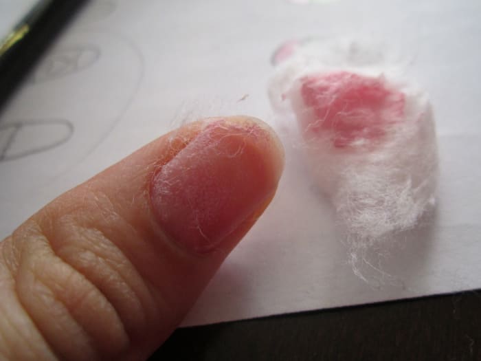 Wait a few minutes then pull off cotton, nail polish will be removed almost completely! Use your bit of cotton to rub off the rest of the polish.