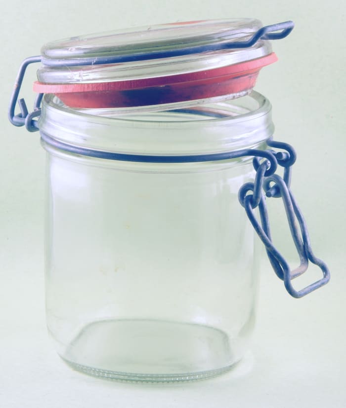 Tall containers require tongs to remove the toothpicks, whereas a jar of this height would be ideal.