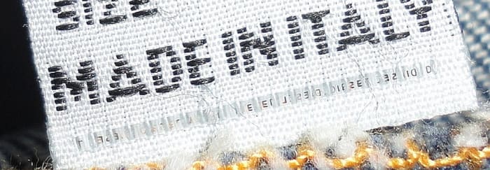 Diesel jeans employ a Micro Stitching security device showing lettering on label tag