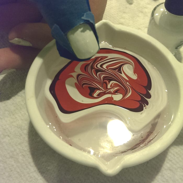 As you can see, I have swirled the nail polish around and have picked a spot to dip my nail in.