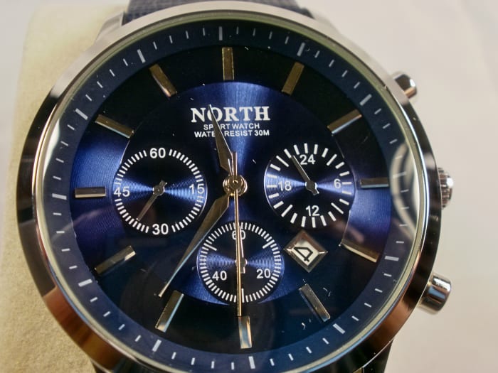 Although the day of month indicator is functional, the three subdials are decorative.