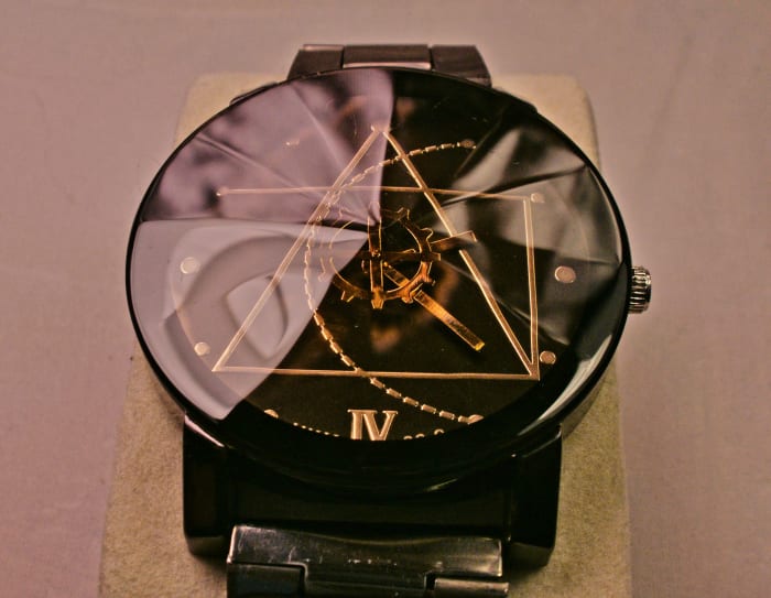 Note that the incorrect Roman Numeral is printed at the bottom of this JWH 88-9 timepiece.