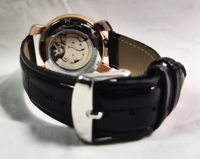 Note that the strap's buckle does not match the color of the Winner U8060 Automatic Watch's case