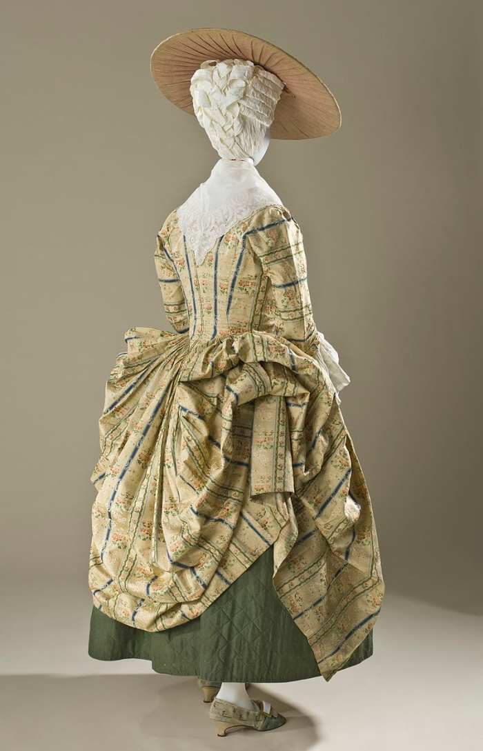 Polonaise style, circa 1775: shorter hemline and drawn-up over-dress