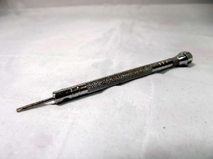 Slightly rusty jeweler's screwdriver is an accessory of my Replica Panerai Luminor Marina