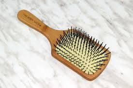 Cheap brushes can make matters worse. Consider investing in a higher-end brush if you have thick hair.