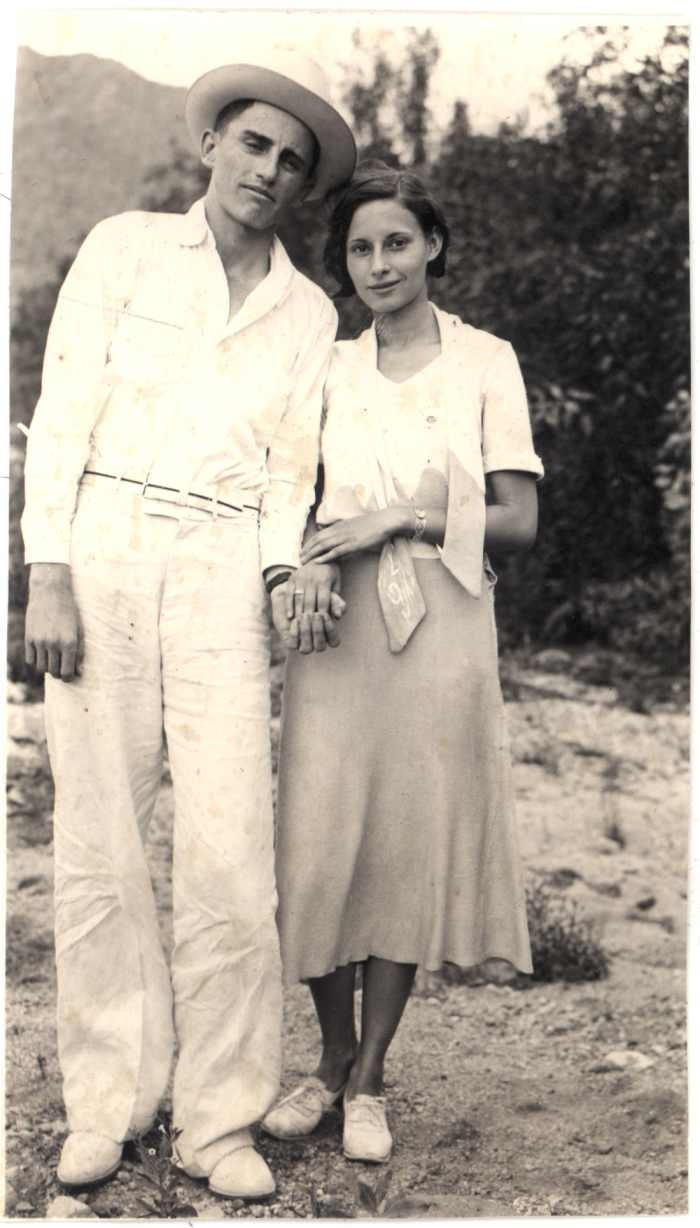 1930s - plain bob haircut; normal waistline;belt; tight at the hips skirt, looser near hem; untied pussy cat bow