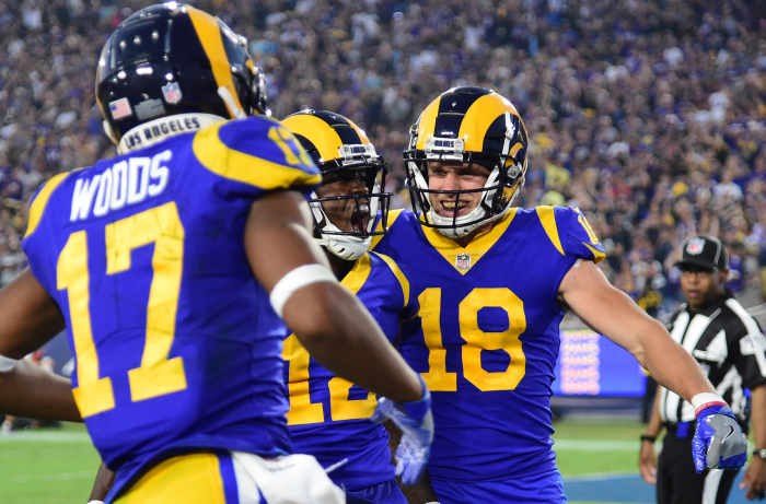 Los Angeles Rams wide receiver, Robert Woods (17), celebrates with fellow receivers, Cooper Kupp (18) and Brandin Cooks (12), after catching a touchdown pass in the second quarter against the Minnesota Vikings in 2018.
