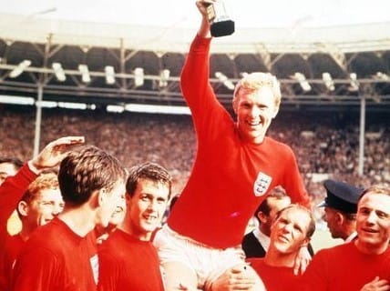 Geoff Hurst being lifted after England's defeat of West Germany at the 1966 World Cup. Hurst remains the only player in Cup history to score a hat-trick in a final match.