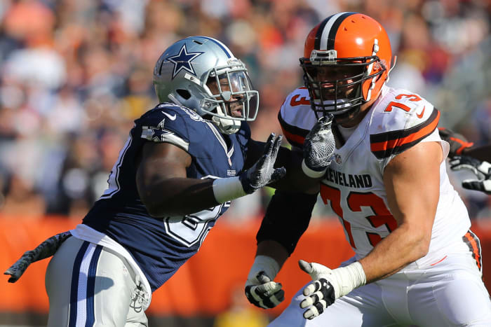 Cleveland Browns offensive tackle, Joe Thomas (73), holds off Dallas Cowboys defensive end, Benson Mayowa, during a 2016 game at FirstEnergy Stadium.