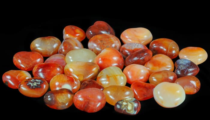 Carnelian naturally occurs in a variety of colors, including light pastel oranges and deep, rich crimsons