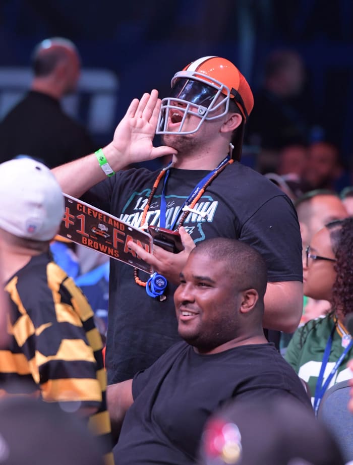 A Cleveland Browns fan shouts after one of the team's draft picks was announced during the 2017 NFL Draft in Philadelphia. It's yet to be determined how good the team's '17 draft class will be, but they do have an unfortunate history of poor drafts.