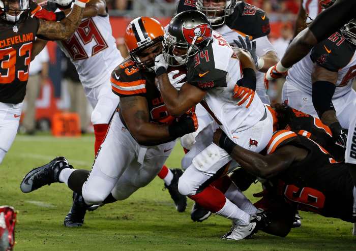Former Cleveland Browns defensive end, Chris Hughes (93), makes a tackle against the Tampa Bay Buccaneers in the 2016 preseason. Hughes was one of few bright spots the Browns had among the players they selected in the 2012 NFL Draft.