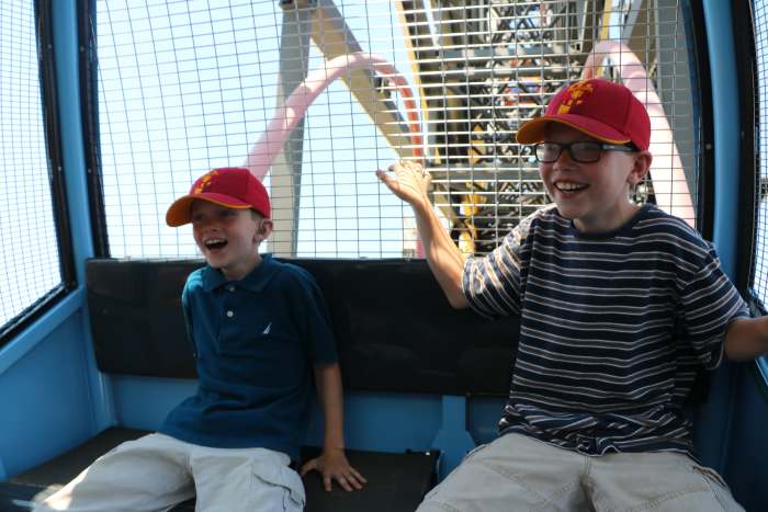 Riding on one of the sliding cars on the Fun Wheel is thrilling for older children, but smaller kids may prefer the stationary cars.