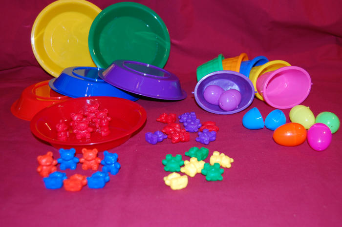 Sorting bears by color to matching plate, and sorting eggs by color to matching basket