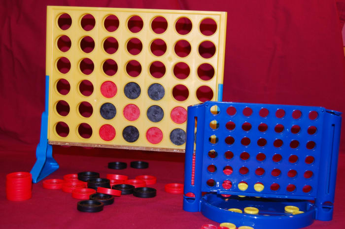 Pick up two to four pieces, one at a time, with one hand. Then place pieces in frame one at a time.