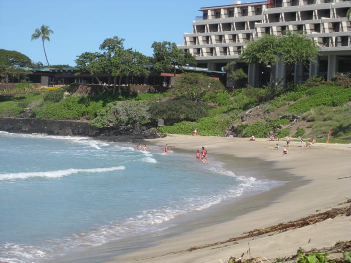As you can see, the beach is a large bay that is sheltered by soft, white sand and the Mauna Kea Beach Resort. Because of the large earthquake in 2006, they had to remodel this hotel, one of the oldest on the island.