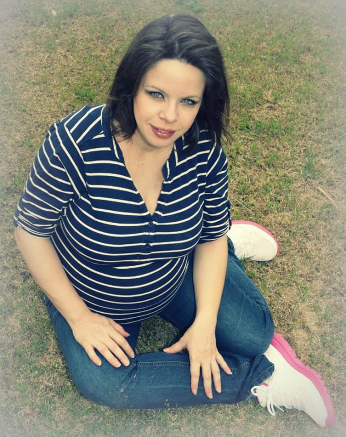 Me, eight months pregnant with twins. The breech positioning made the SPD less cripping at times.