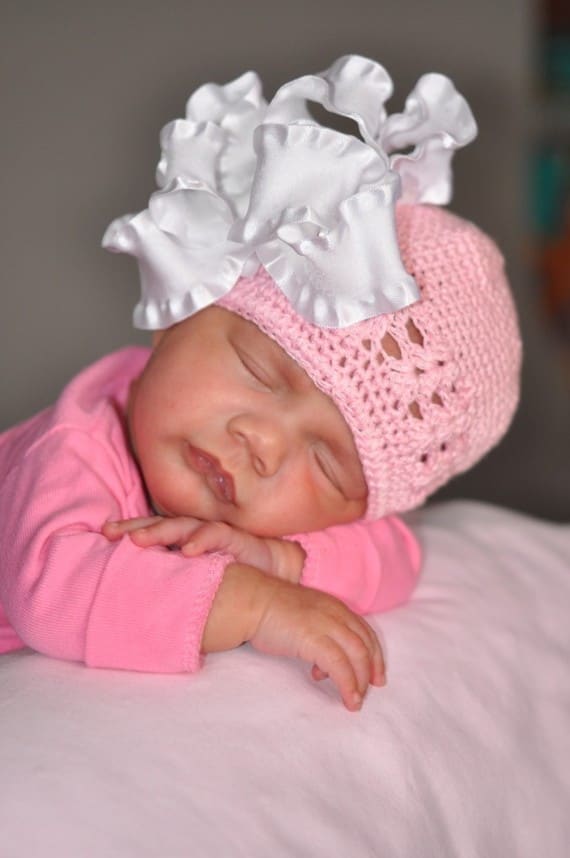#1 Sleeping Infant with Pink Cap and White Bow