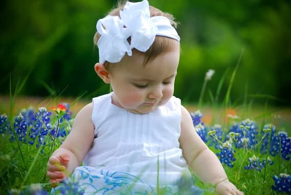 #2 Baby Girl in White Dress, White Bow and Blue Flowers