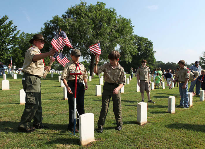 It is common practice for Boy Scout troops nationwide to place flags on military graves on Memorial Day.