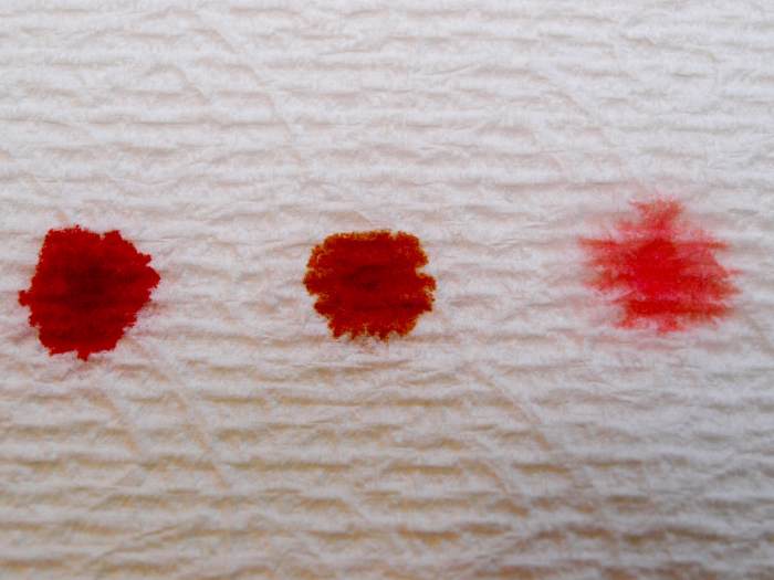 The color and the amount of blood are two important things to note. The color might range from pale pink to brown to red.