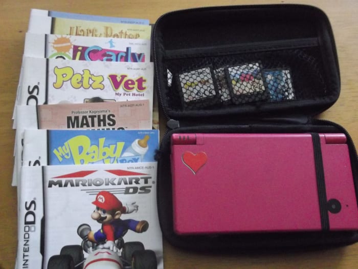 Have a new game hidden away for each leg of the journey. If your child is bored with the last one, produce the next game when you need them to stay quiet and still. :)