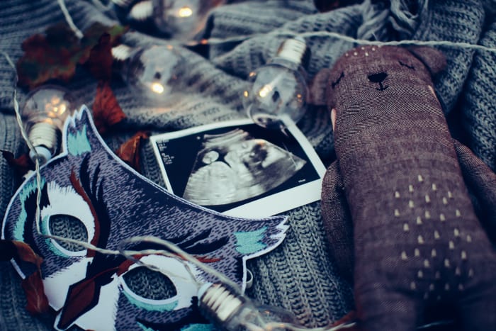I'm going to make an educated guess that, ultrasound not even included, this entire photo cost at least $70 to produce. Cute kid stuff isn't cheap.