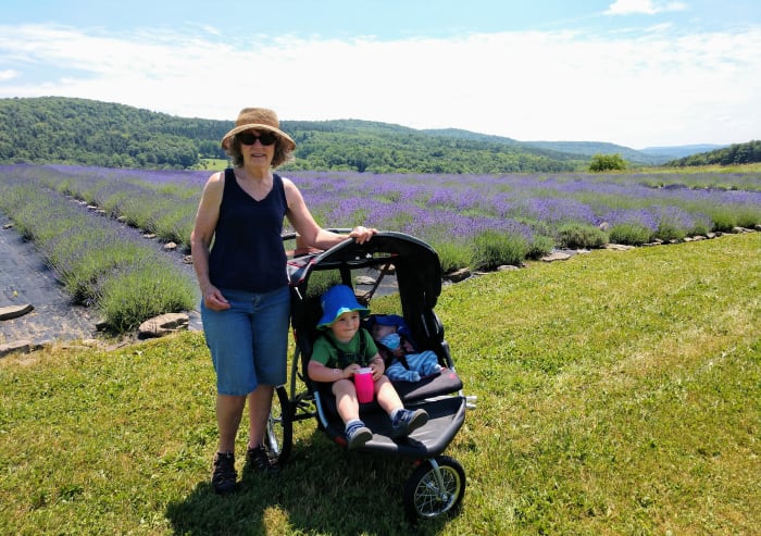 While the front/back seater double stroller is great for running errands, the side-by-side jogger stroller is better for more rugged adventures, like a walk with Grandma at the lavendar farm!